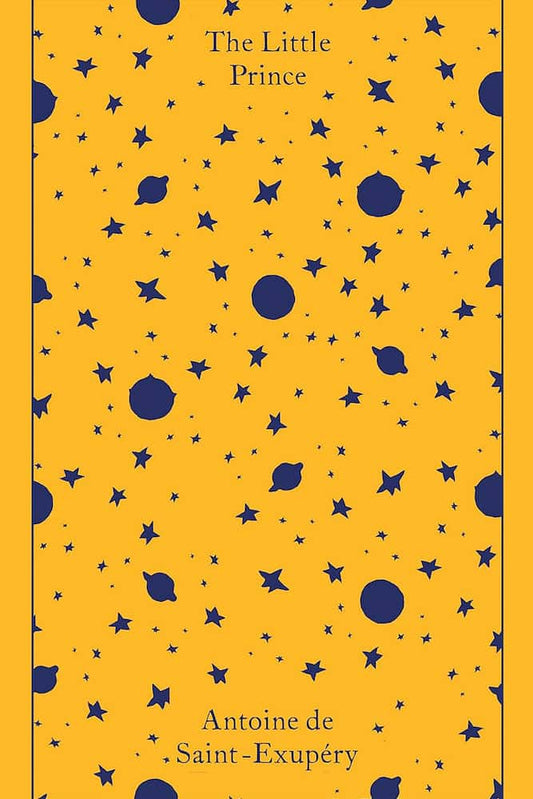 Book cover of 'The Little Prince' with a pattern of blue stars and planets on a yellow background.
