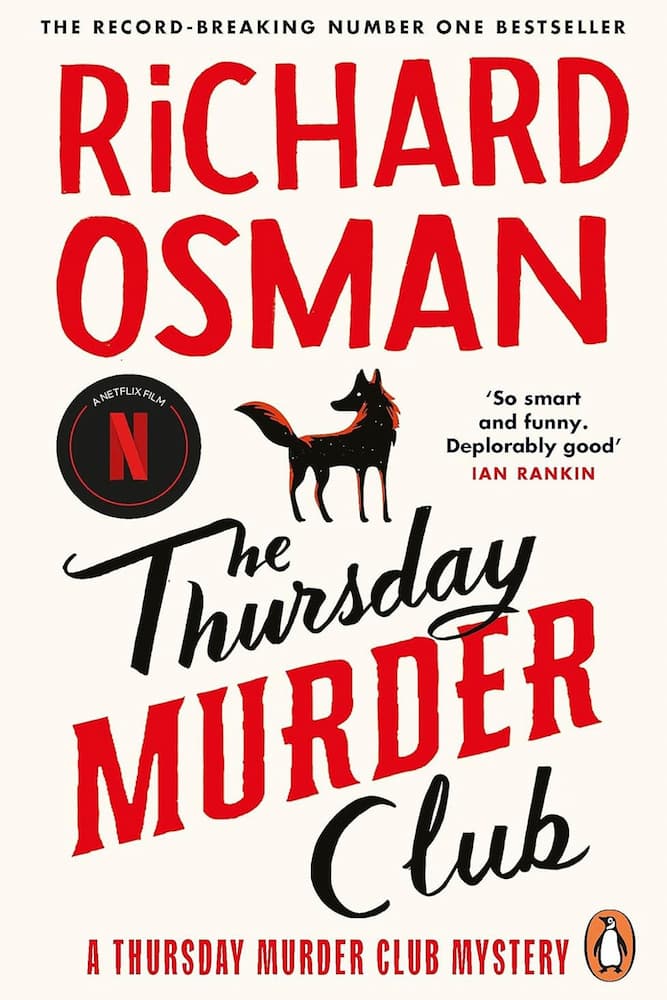Book cover of 'The Thursday Murder Club' by Richard Osman with a dog illustration and Netflix logo.